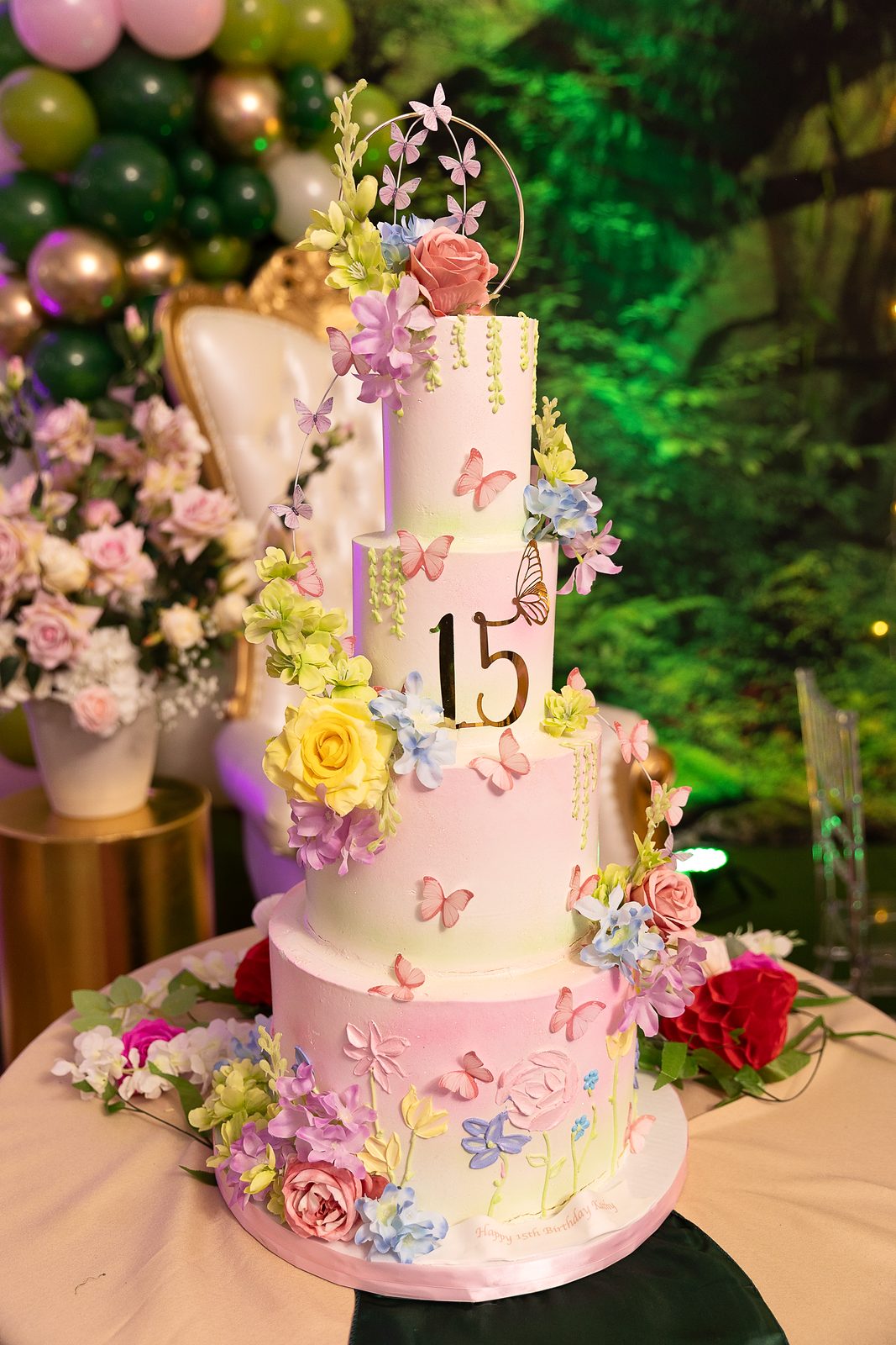 Four-tier floral 15th birthday cake
