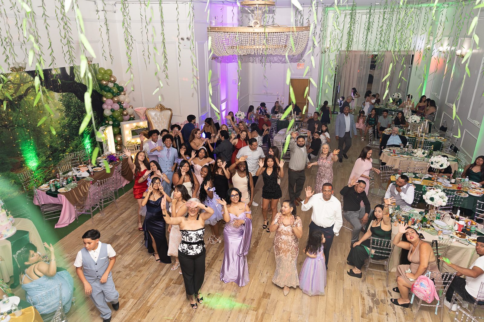 Guests dancing at a 15th birthday party, seen from above